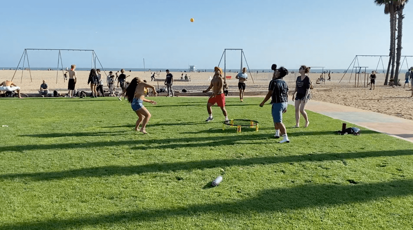 A group plays sports by Santa Monica Beach on May 23, 2020. (KTLA)