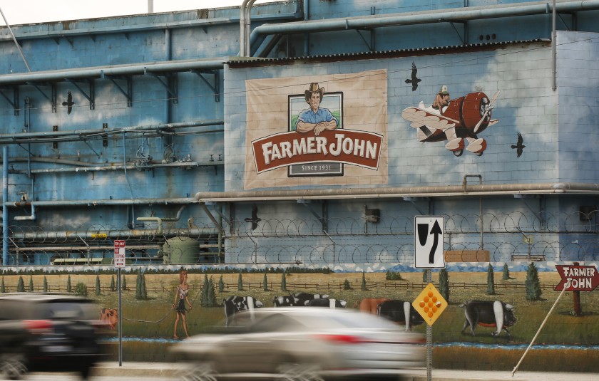 At least 153 workers at the Farmer John plant in Vernon have been diagnosed with COVID-19. (Al Seib / Los Angeles Times)