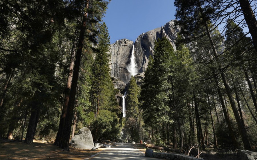 An empty trail leads to the Upper and Lower Yosemite Falls while the national park is closed due to coronavirus in April 2020. (Carolyn Cole / Los Angeles Times)