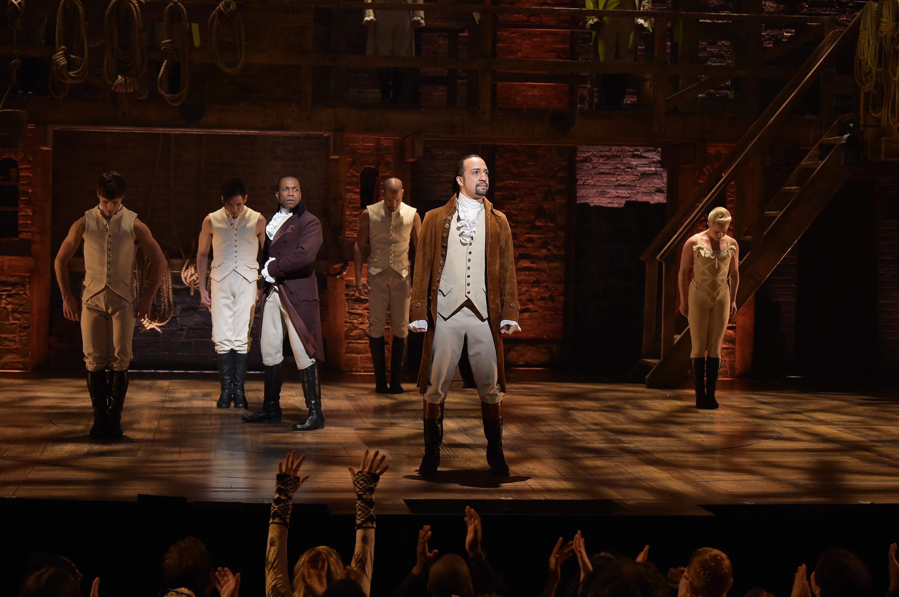 Actor Leslie Odom, Jr. (L) and actor, composer Lin-Manuel Miranda (R) perform on stage during "Hamilton" GRAMMY performance for The 58th GRAMMY Awards at Richard Rodgers Theater on February 15, 2016 in New York City. (Theo Wargo/Getty Images)