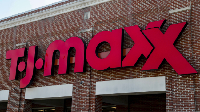 A sign hangs outside a T.J. Maxx store, Tuesday, May 16, 2017, in Cincinnati. (AP Photo/John Minchillo)