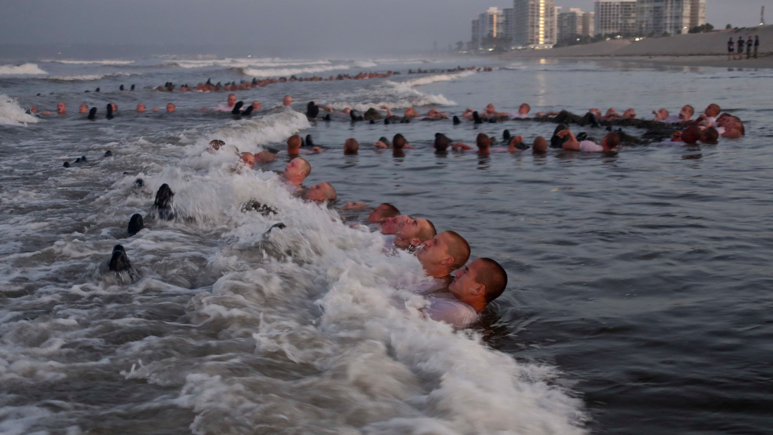 SEAL candidates participate in surf immersion during Basic Underwater Demolition/SEAL training at Naval Special Warfare Center in Coronado on May 4, 2020. (U.S. Navy/Mass Communication Specialist 1st Class Anthony Walker)