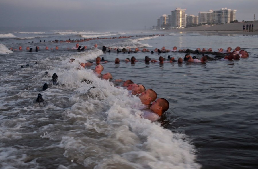 SEAL candidates participate in surf immersion during Basic Underwater Demolition/SEAL training at Naval Special Warfare Center in Coronado on May 4, 2020. (U.S. Navy/Mass Communication Specialist 1st Class Anthony Walker)