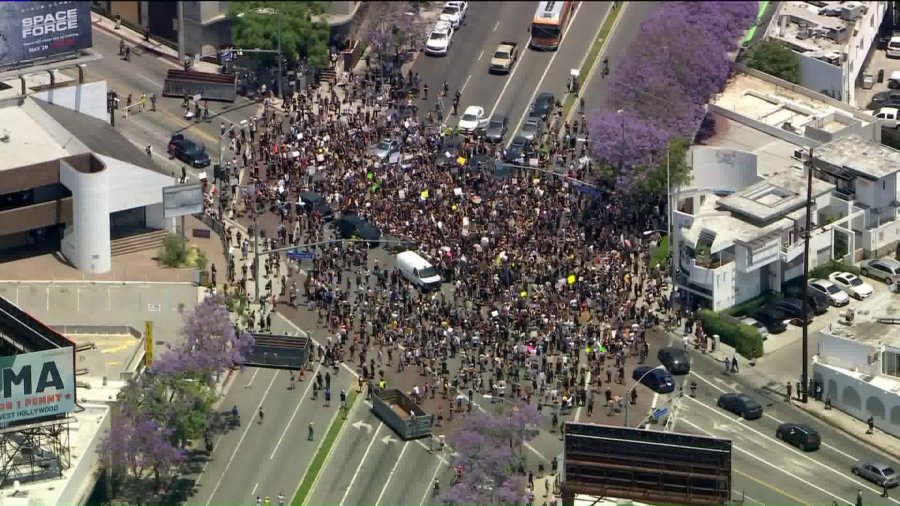 Sky5 was overhead as hundreds appeared to be marching near La Cienega and Santa Monica boulevards on June 3, 2020. (KTLA)