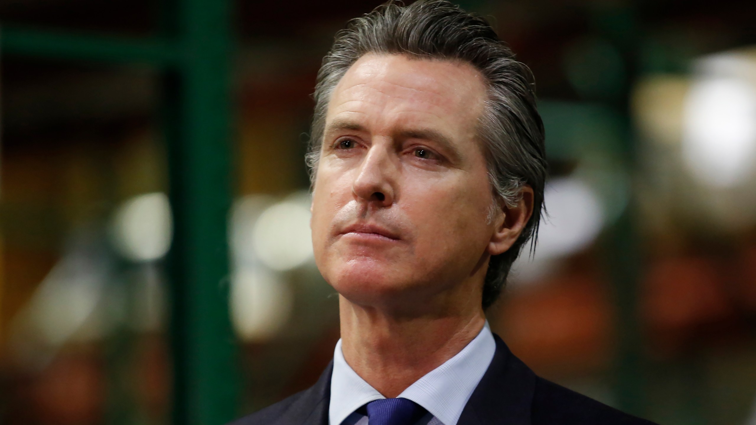 Gov. Gavin Newsom listens to a reporter's question during a news conference in Rancho Cordova on June 26, 2020. (Rich Pedroncelli / AP)