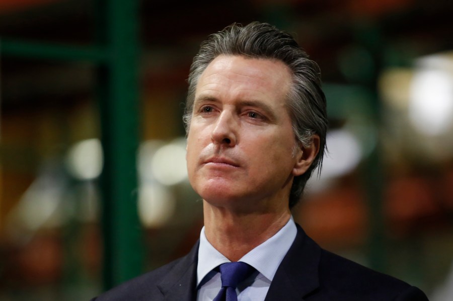 Gov. Gavin Newsom listens to a reporter's question during a news conference in Rancho Cordova on June 26, 2020. (Rich Pedroncelli / AP)