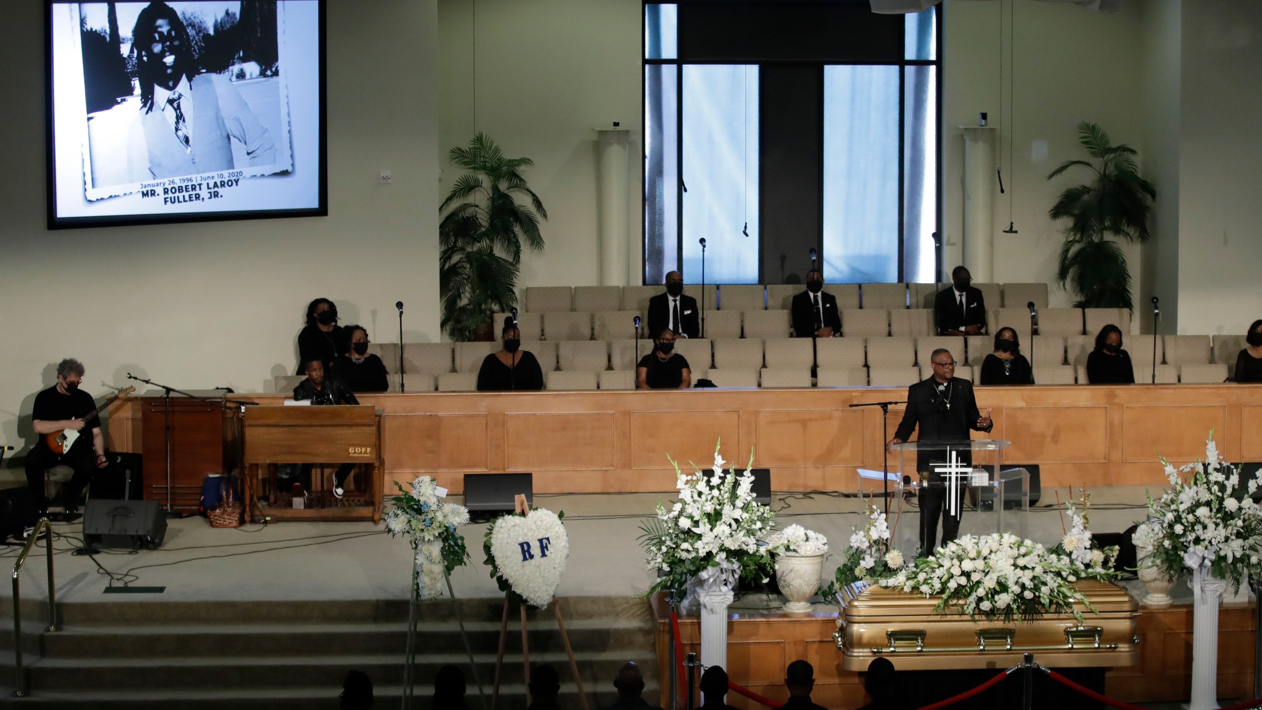 A pastor eulogizes Robert Fuller during a funeral in his honor in Littlerock on June 30, 2020. (Marcio Jose Sanchez / Associated Press)