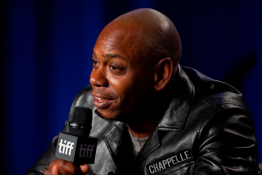 Dave Chappelle speaks during the 'A Star is Born' press conference at the Toronto International Film Festival in Toronto, Ontario, Sept. 9, 2018. (GEOFF ROBINS/AFP via Getty Images)