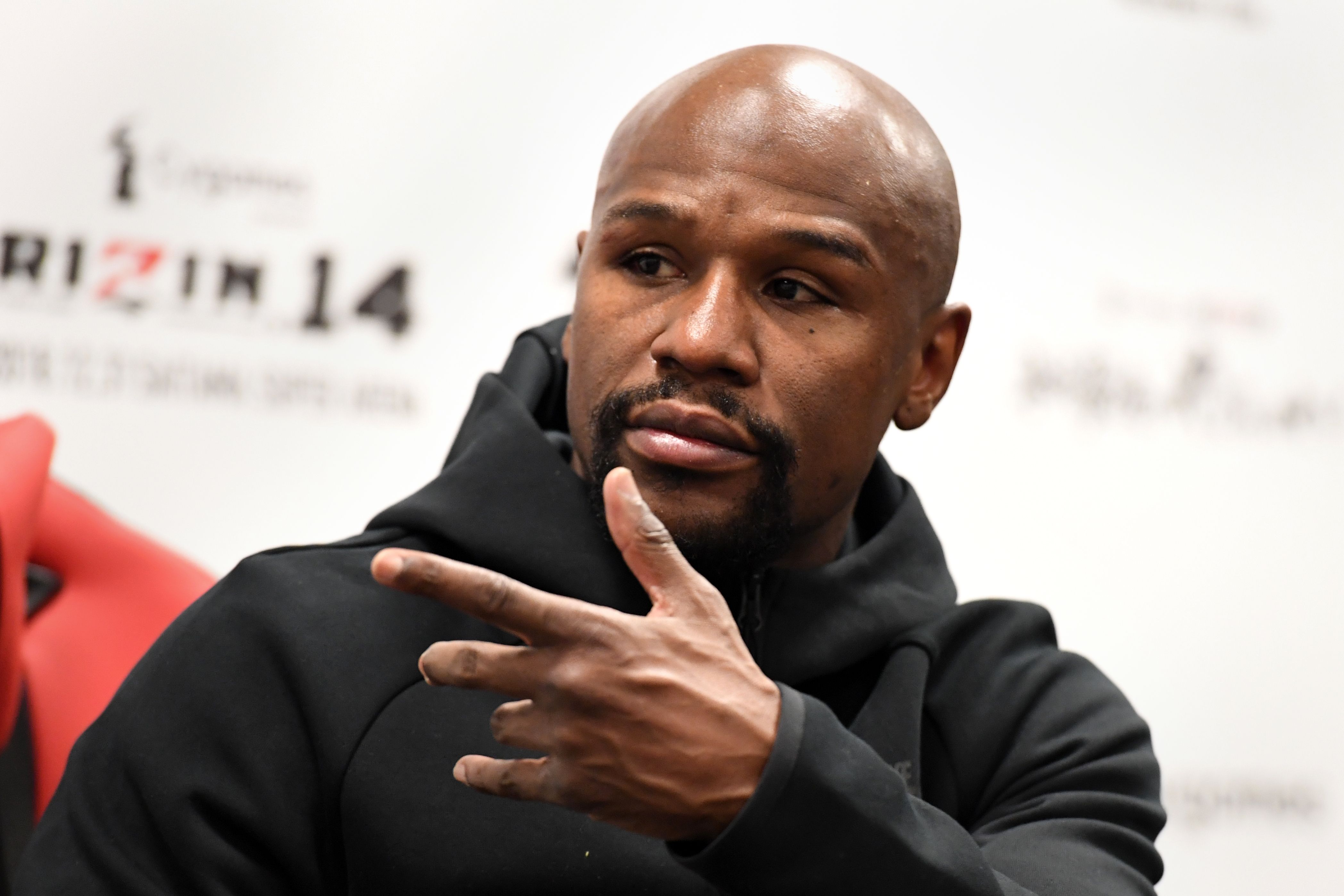 U.S. boxing legend Floyd Mayweather Jr gestures during a press conference