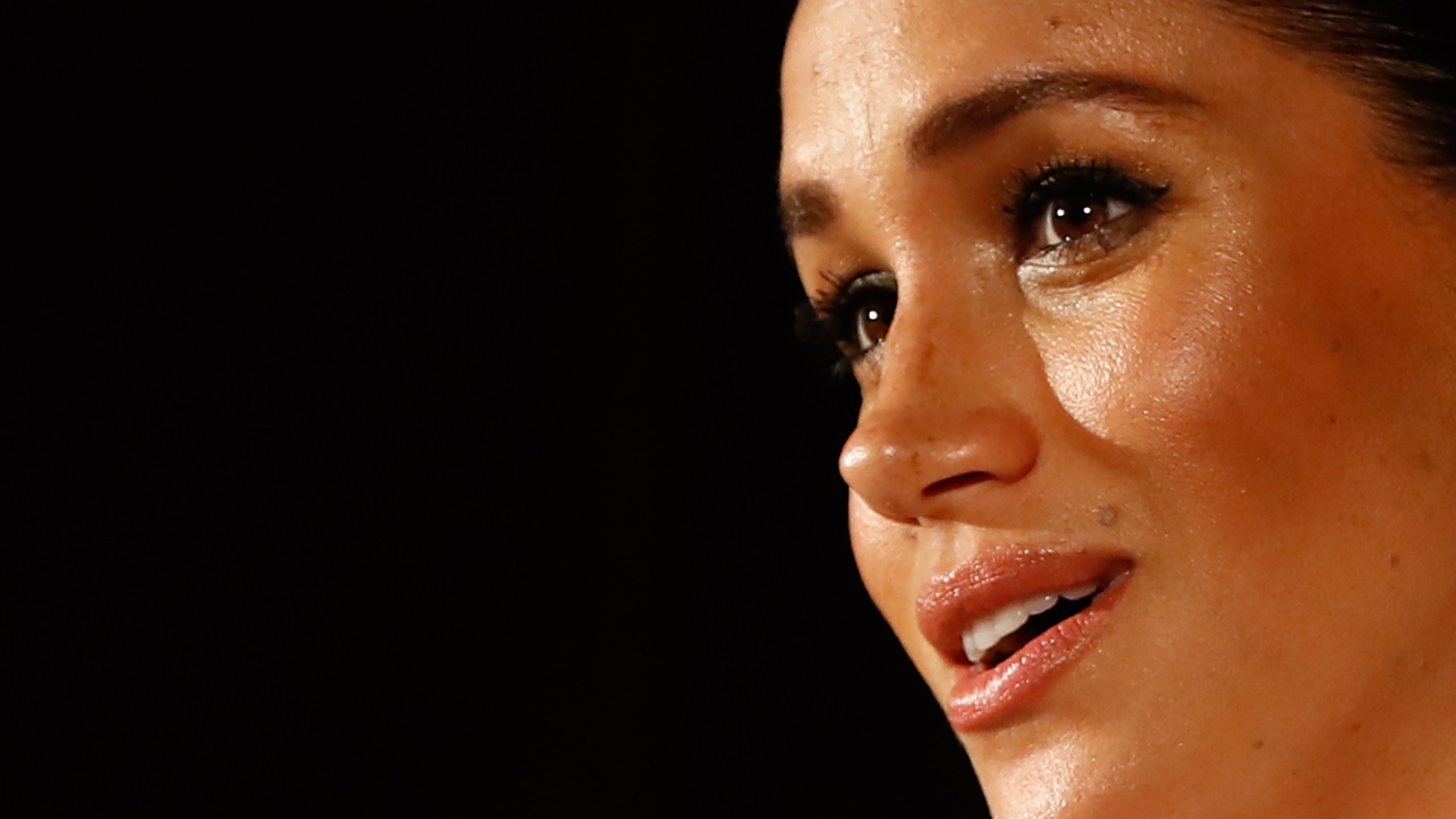 Meghan Markle, Duchess of Sussex, presents the Celebrating Excellence Award in London on Feb. 7, 2019. (TOLGA AKMEN/AFP via Getty Images)