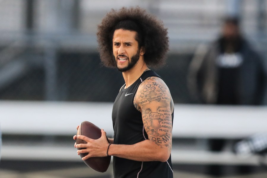 Colin Kaepernick looks to make a pass during a private NFL workout held at Charles R. Drew High School on Nov. 16, 2019 in Riverdale, Georgia. (Carmen Mandato/Getty Images)