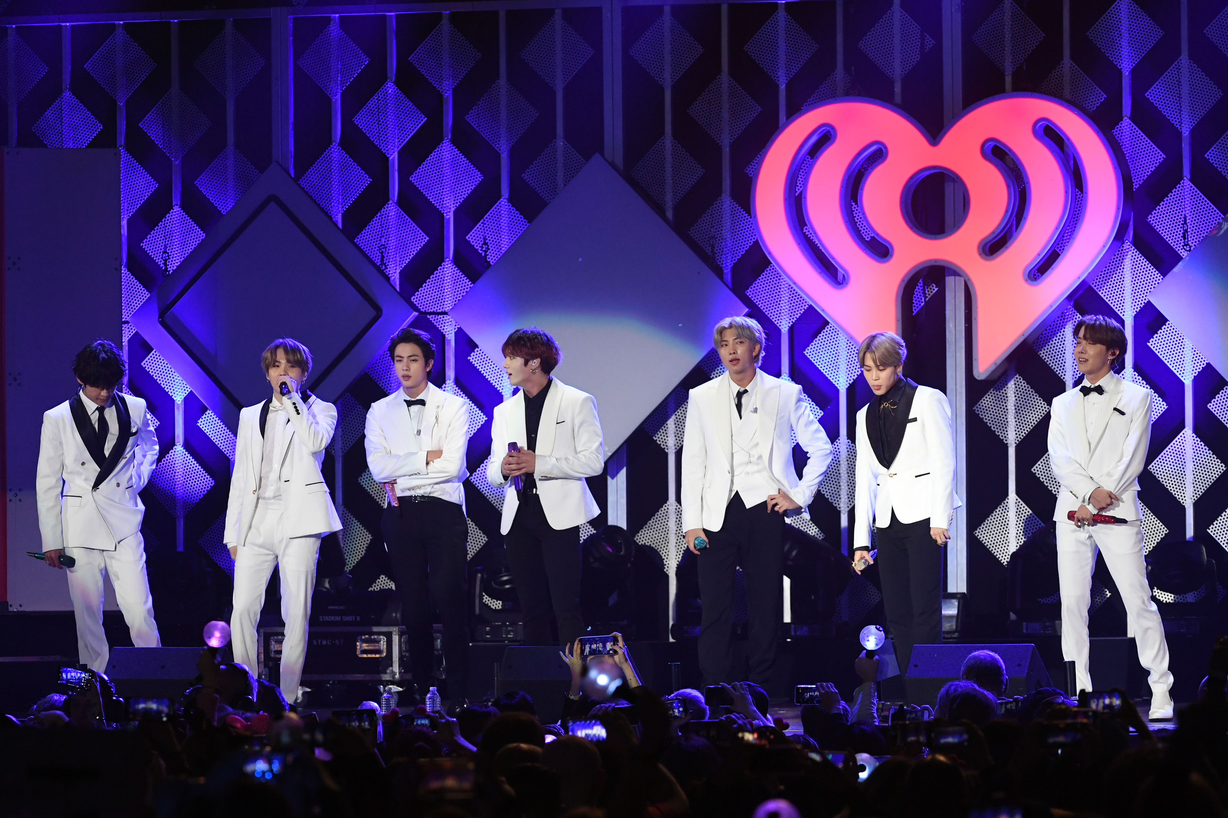 From left: V, Suga, Jin, Jungkook, RM, Jimin, and J-Hope of BTS perform onstage during 102.7 KIIS FM's Jingle Ball 2019 at the Forum on Dec. 6, 2019. (Kevin Winter/Getty Images for iHeartMedia)