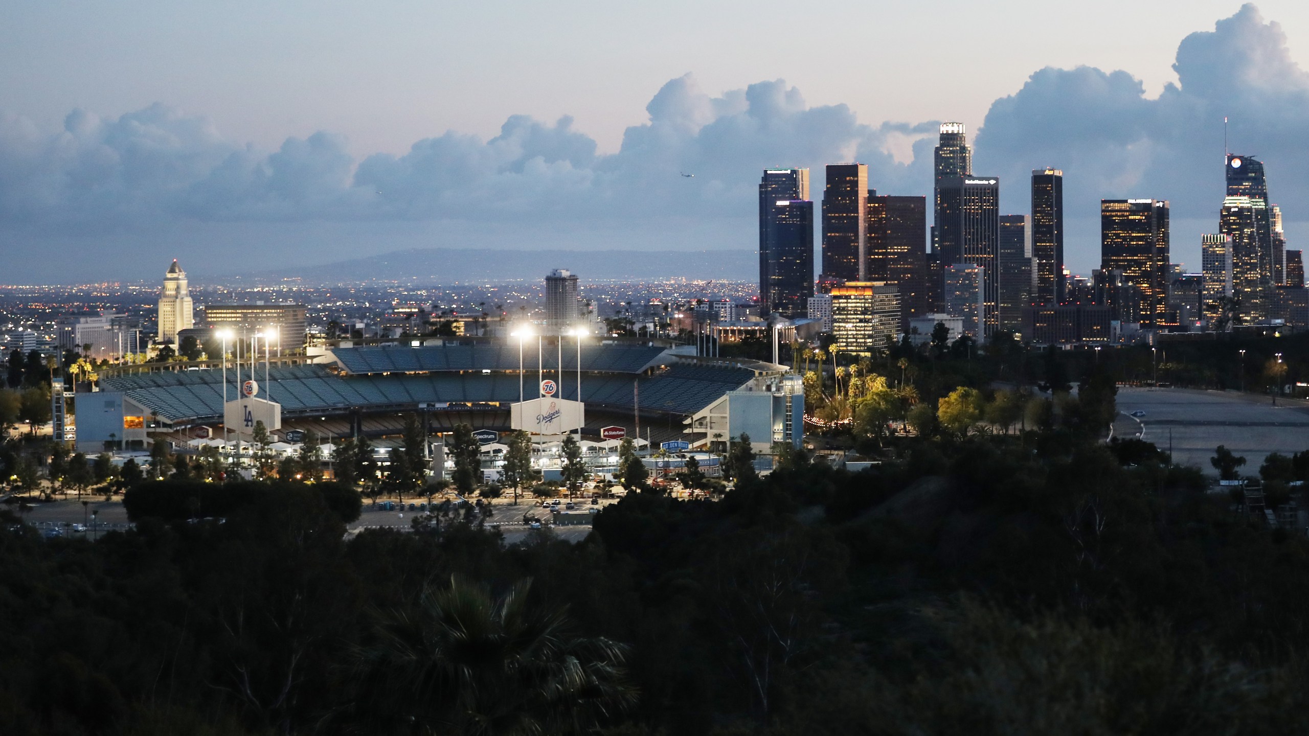 Downtown L.A. rises behind an empty Dodger Stadium on what was supposed to be Major League Baseball's Opening Day on March 26, 2020. (Mario Tama/Getty Images)