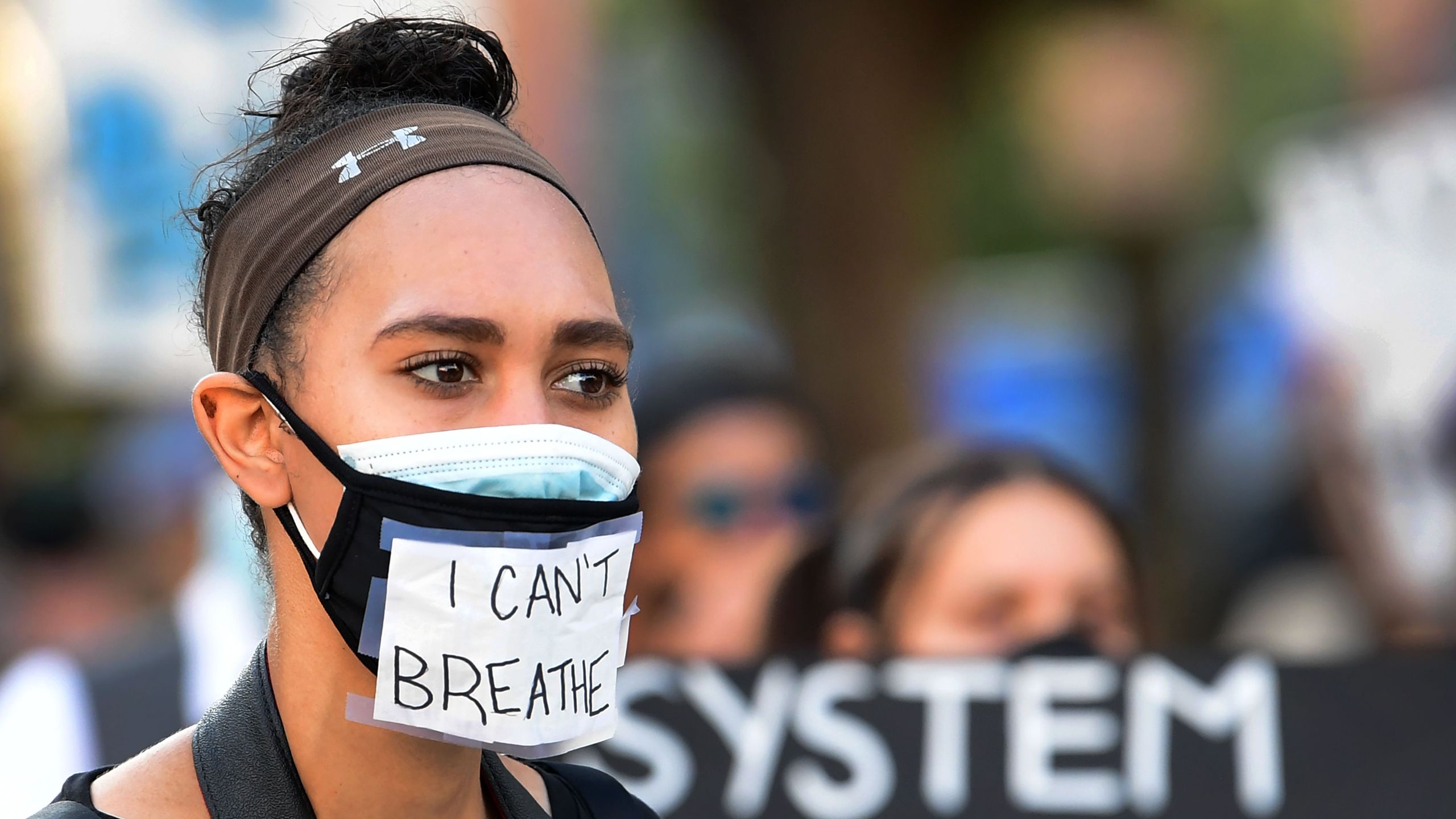 Protesters gathered near City Hall to protest the death of George Floyd under police custody, in Los Angeles on June 3, 2020. (FREDERIC J. BROWN/AFP via Getty Images)