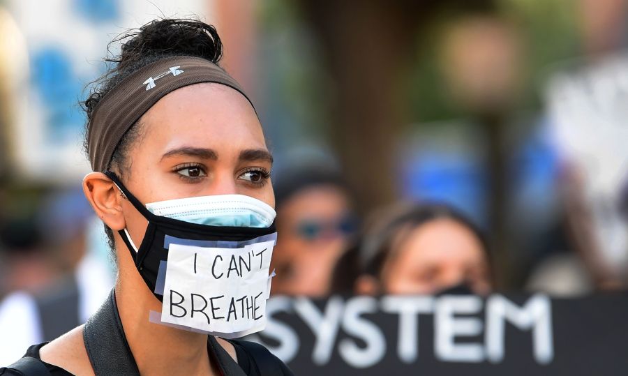 Protesters gathered near City Hall to protest the death of George Floyd under police custody, in Los Angeles on June 3, 2020. (FREDERIC J. BROWN/AFP via Getty Images)