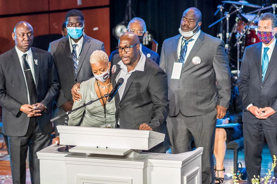 George Floyd's brother Philonise Floyd stands with cousin Shareeduh Tate as he speaks during a memorial service in honor of his brother on June 4, 2020, at North Central University's Frank J. Lindquist Sanctuary in Minneapolis, Minn. (KEREM YUCEL/AFP via Getty Images)