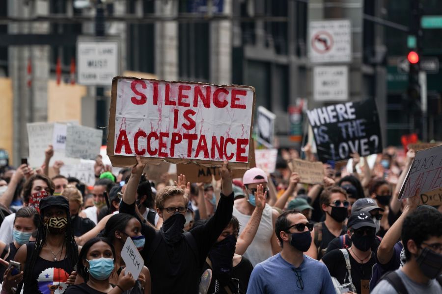 Protesters walk through traffic in lower Manhattan during a peaceful protest against police brutality and racism, on June 6, 2020, in New York.(BRYAN R. SMITH/AFP via Getty Images)