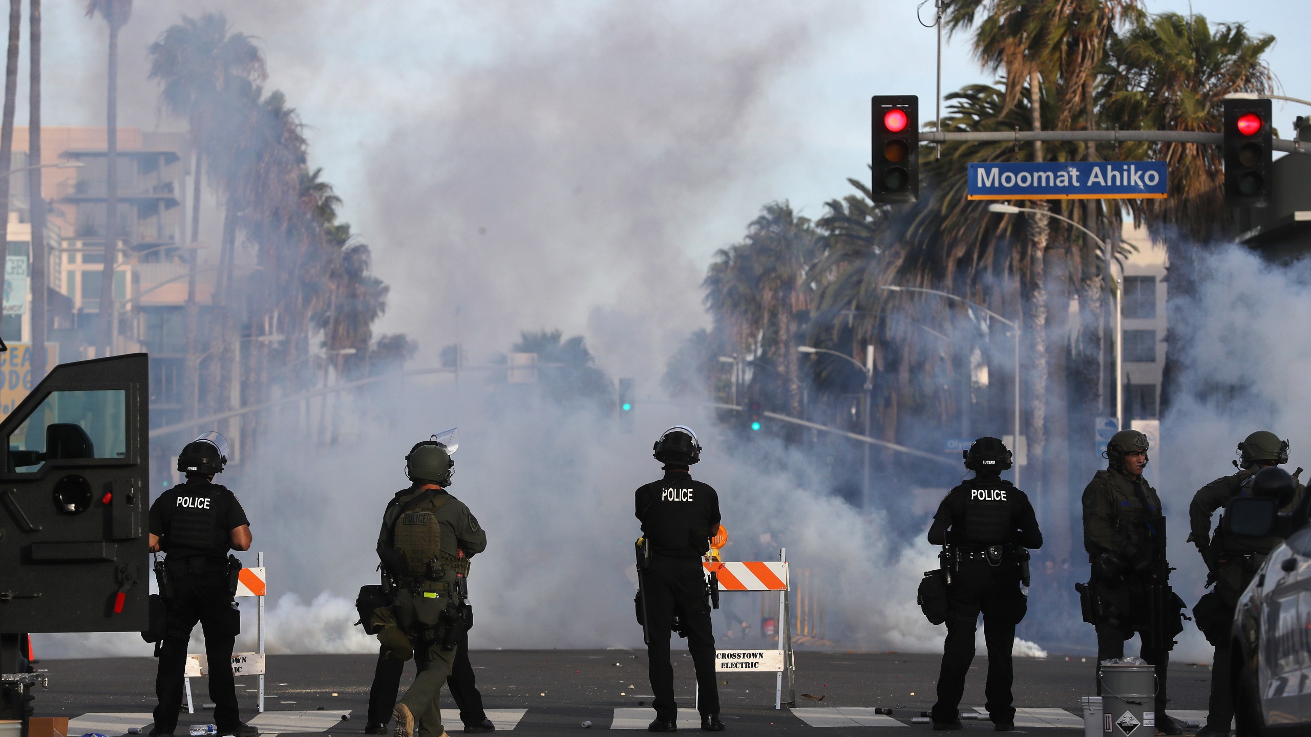 Police watch as tear gas is deployed during demonstrations in Santa Monica following the death of George Floyd on May 31, 2020.(Mario Tama/Getty Images)