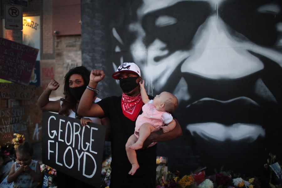 People visit a memorial at the site where George Floyd was killed on June 3, 2020, in Minneapolis, Minnesota. (Scott Olson/Getty Images)