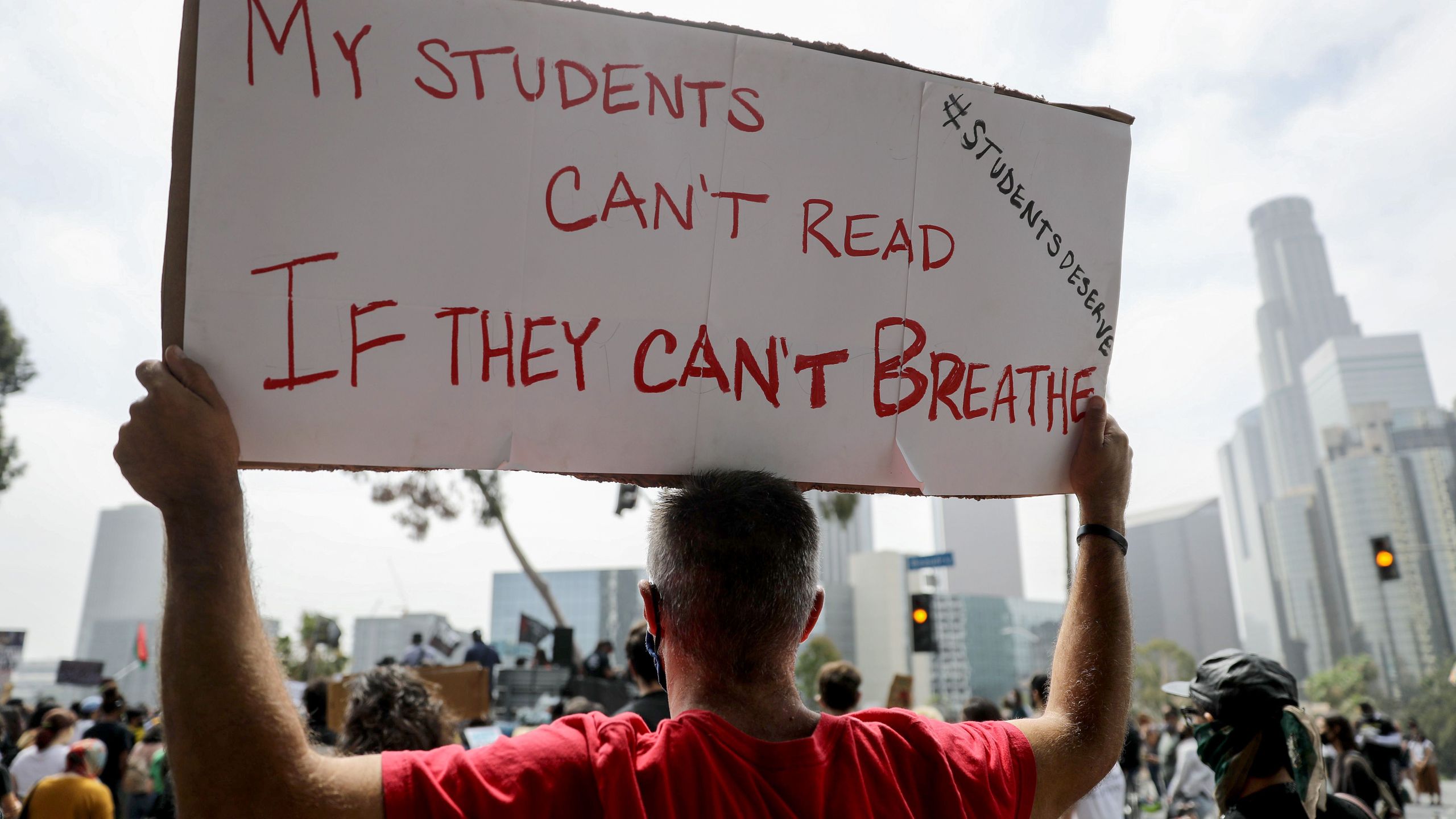 Black Lives Matter-Los Angeles supporters protest outside the Unified School District headquarters calling on the board of education to defund school police on June 23, 2020 in Los Angeles. (Mario Tama/Getty Images)