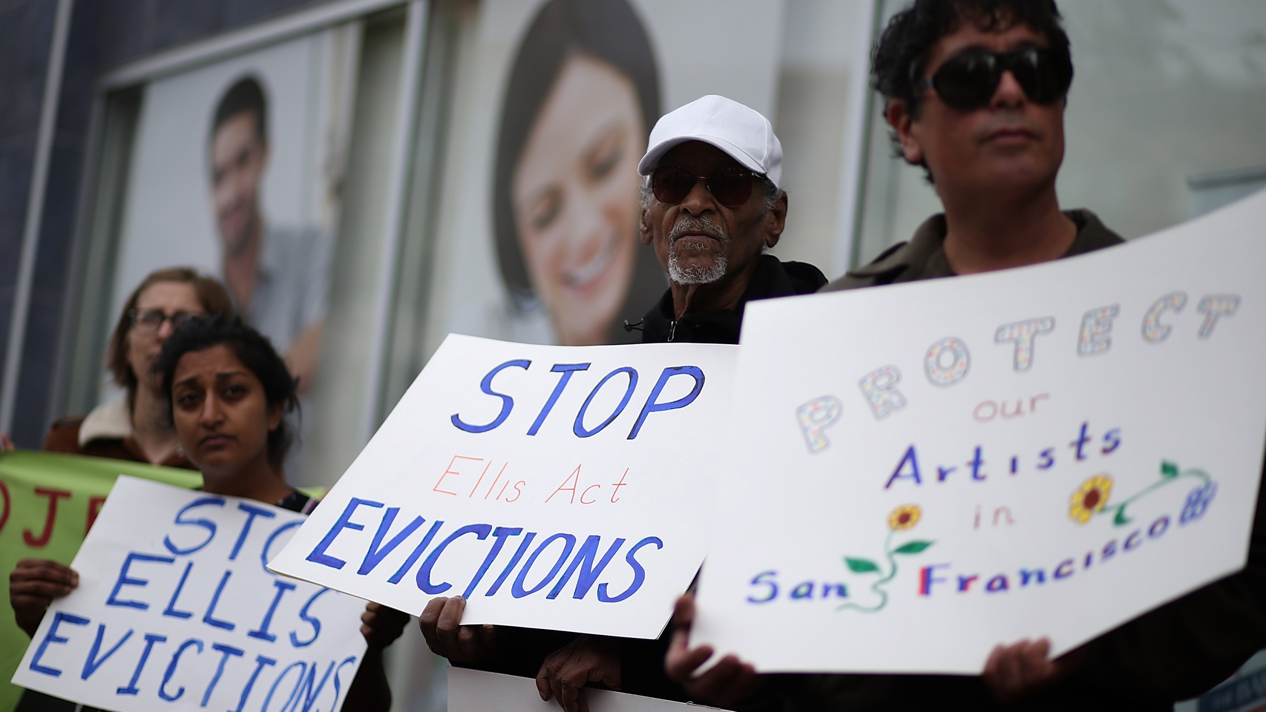 Activists and tenants stage a protest against A landlord's attempts to evict them from a San Francisco building on March 8, 2016. (Justin Sullivan/Getty Images)