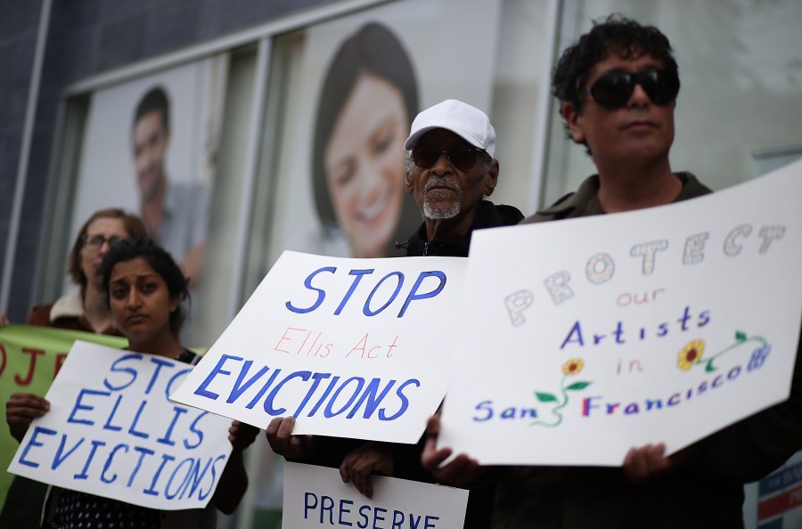 Activists and tenants stage a protest against A landlord's attempts to evict them from a San Francisco building on March 8, 2016. (Justin Sullivan/Getty Images)