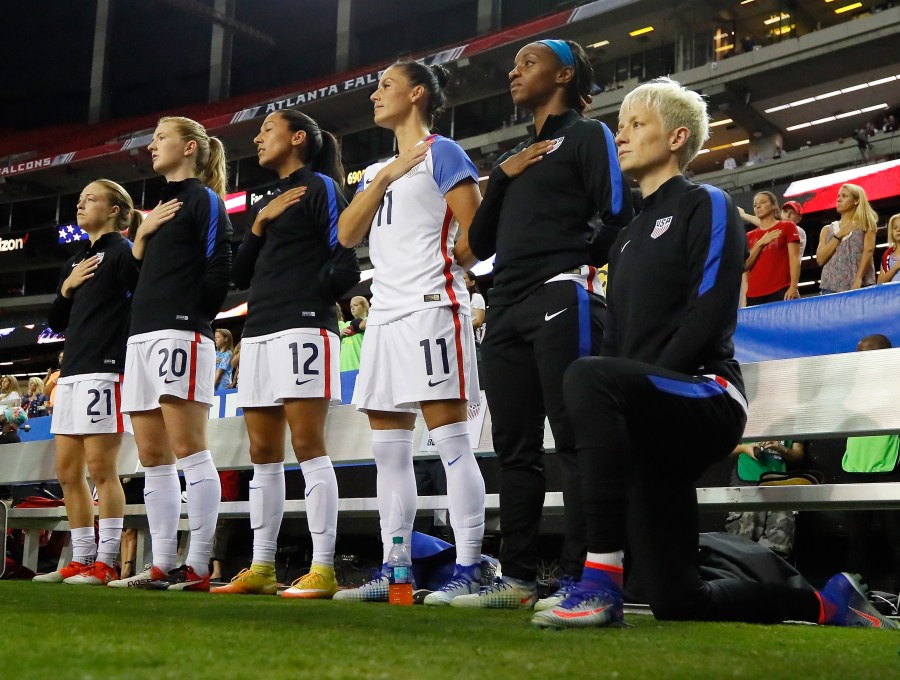 Megan Rapinoe #15 kneels during the national anthem before a match between the United States and the Netherlands at Georgia Dome on Sept. 18, 2016 in Atlanta. (Kevin C. Cox/Getty Images)