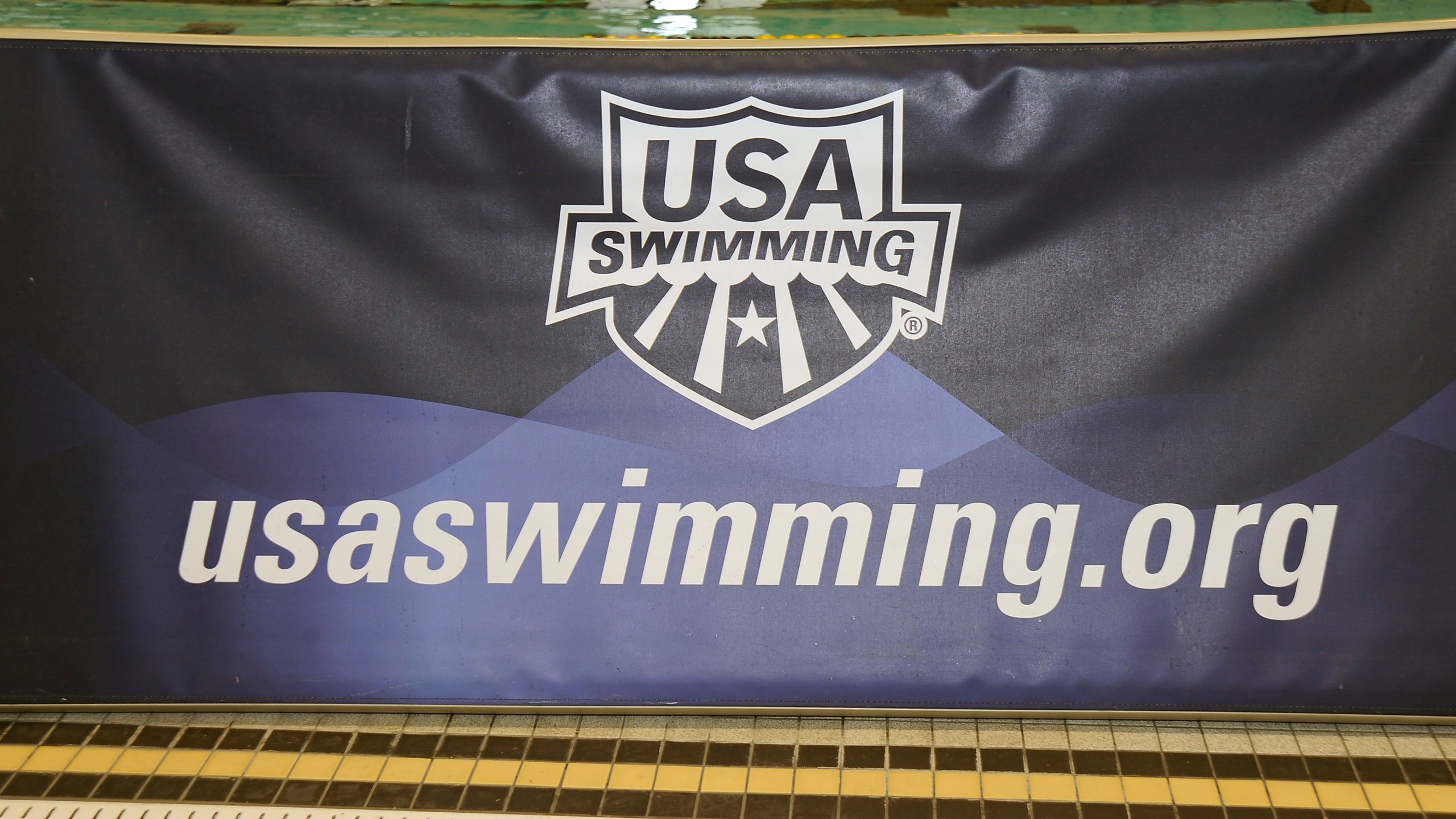 A banner for the USA Swimming foundation is displayed at the Missouri Grand Prix on February 15, 2010 at the Mizzou Aquatic Center in Columbia, Missouri. (G. Newman Lowrance/Getty Images)