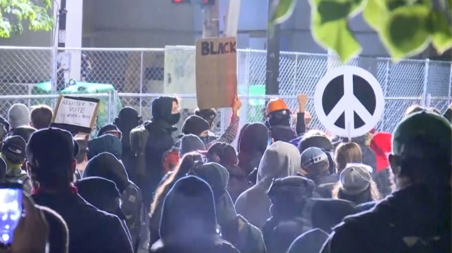 Smoke is seen in the air as protesters gather in Portland, Oregon, on June 7, 2020. (KOIN via CNN)