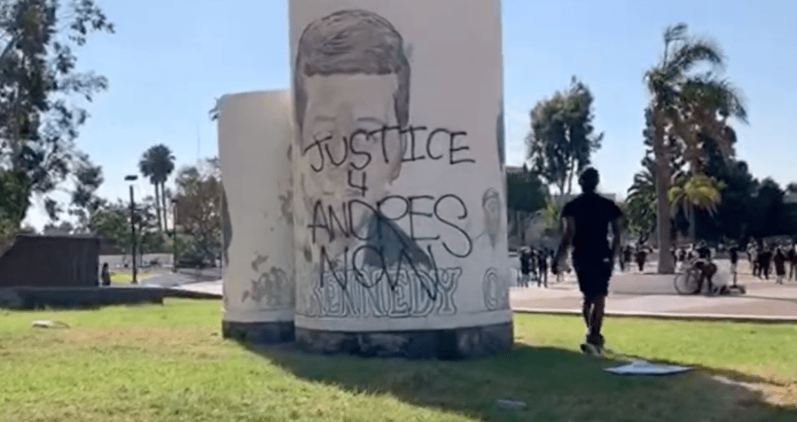 Graffiti reading "Justice for Andres Guardado" outside Compton City Hall on June 21, 2020. (Downey Transparent eye/ YouTube)