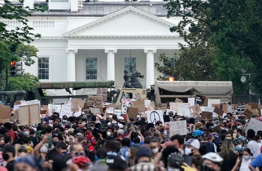 National Guard vehicles are used to block 16th Street near Lafayette Park and the White House as Demonstrators participate in a peaceful protest against police brutality and the death of George Floyd, on June 3, 2020, in Washington, DC. (Drew Angerer/Getty Images)