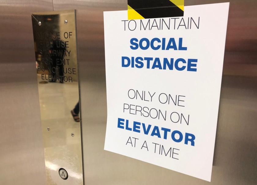 Elevators in the state Capitol have been limited to one person per ride and strict limits established on in-person seating for public hearings. (John Myers / Los Angeles Times)