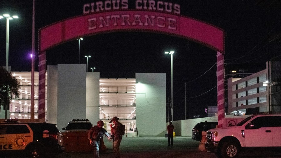 Police officers patrol following the report of a shooting outside Circus Circus hotel and casino, on South Las Vegas Boulevard, on June 1, 2020, in downtown Las Vegas. (BRIDGET BENNETT/AFP via Getty Images)