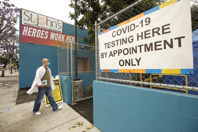 A worker walks into a Los Angeles County coronavirus testing center in this undated photo. (Al Seib/Los Angeles Times)