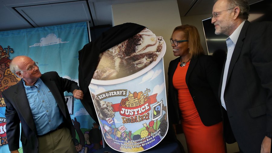 Ben & Jerry's co-founders Ben Cohen (L) and Jerry Greenfield (R) announce the new flavor, Justice Remix'd, during a press conference with Advancement Project executive director Judith Dianis (C) on September 03, 2019 in Washington, DC. (Win McNamee/Getty Images)