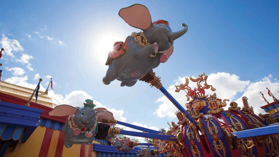 Guests take a spin on “Dumbo, the Flying Elephant” at Magic Kingdom Park. With an unprecedented two Dumbos aloft, guests get to their flights faster aboard one of the park’s most iconic attractions. Connecting the two Dumbos, a new “big top” area allows guests to immerse themselves in circus lore in a series of fun, interactive experiences before a spin with their favorite circus elephant. The double Dumbos help anchor the Storybook Circus area of New Fantasyland at Magic Kingdom Park — part of the largest expansion in Magic Kingdom history. (Disney)