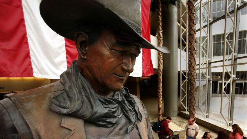 A statue of John Wayne at the John Wayne Airport is seen in this undated photo. (Mark Boster / Los Angeles Times)