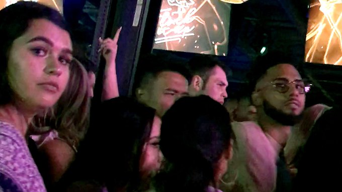 A screenshot from a Los Angeles Times video shows the crowd inside an Arizona nightclub.