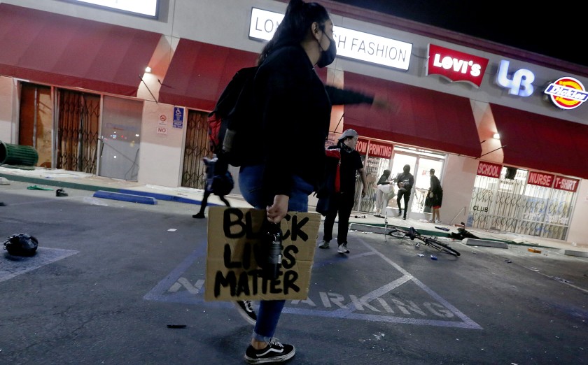 A strip mall at Seventh Street and Long Beach Boulevard in Long Beach is ransacked on May 31, 2020. (Luis Sinco / Los Angeles Times)