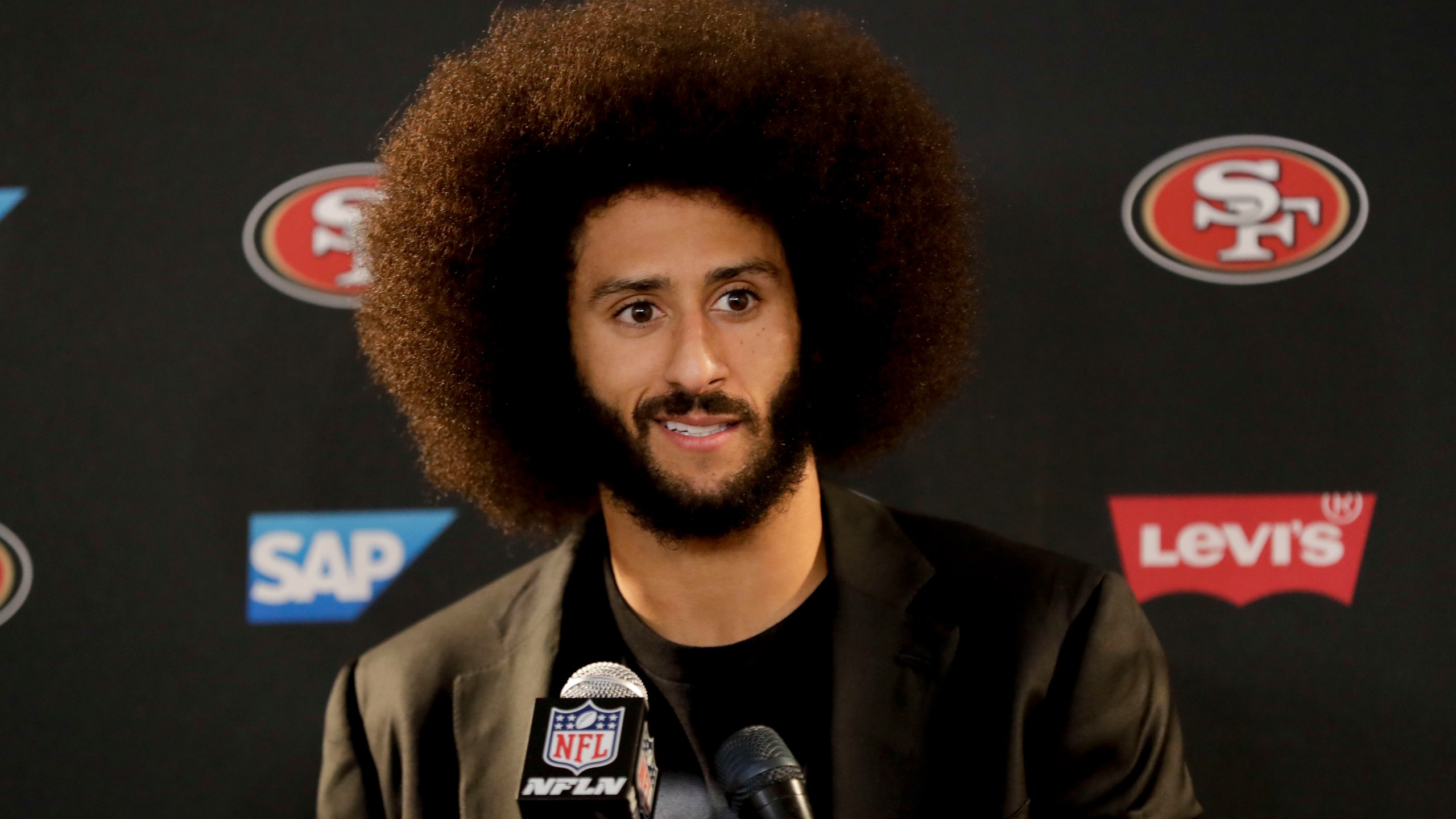 In this Dec. 24, 2016, file photo San Francisco 49ers quarterback Colin Kaepernick talks during a news conference after an NFL football game against the Los Angeles Rams. (AP Photo/Rick Scuteri, File)