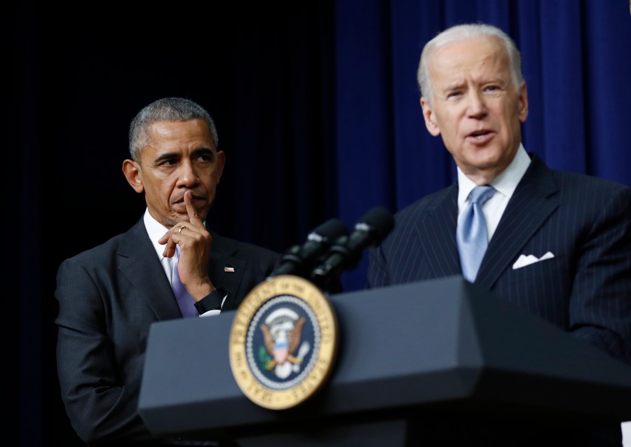 In this Dec. 13, 2016, file photo, President Barack Obama listens as Vice President Joe Biden speaks in the South Court Auditorium in the Eisenhower Executive Office Building on the White House complex in Washington. (AP Photo/Carolyn Kaster, File)