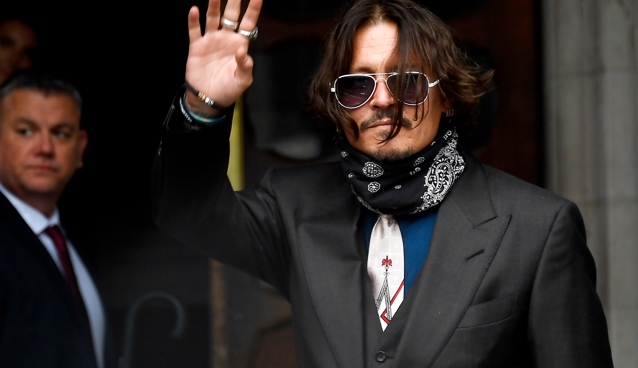 Johnny Depp arrives at the High Court in London, Wednesday July 8, 2020. (AP Photo/Alberto Pezzali)