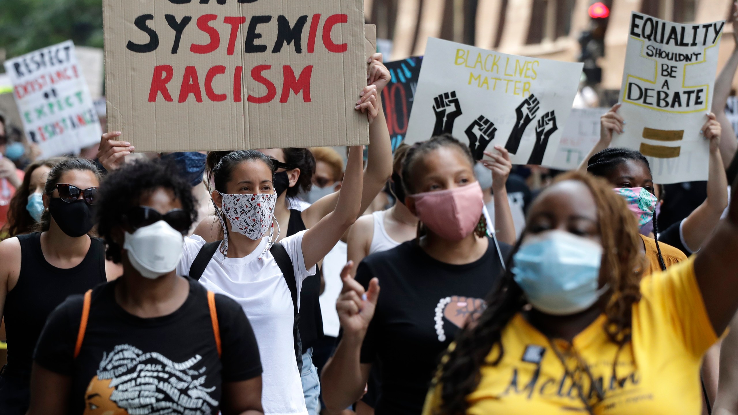 In this June 19, 2020, file photo, people demonstrate in Chicago to mark Juneteenth. (Nam Y. Huh/Associated Press)