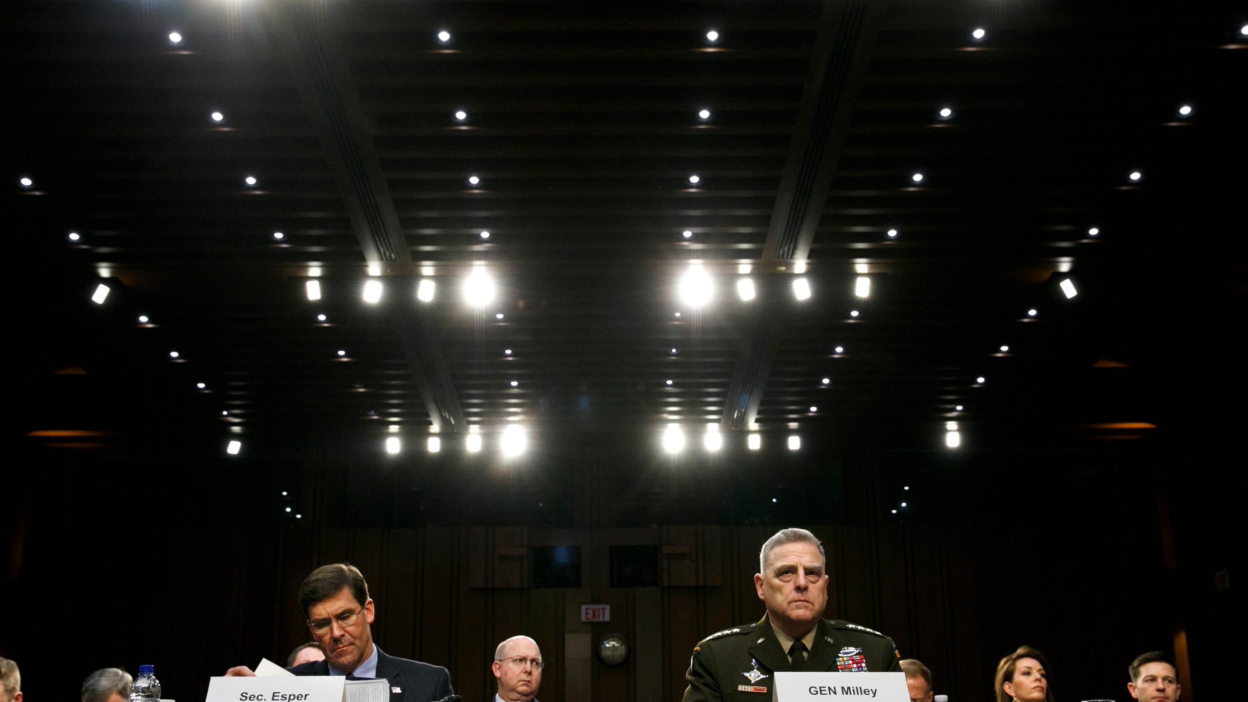 Defense Secretary Mark Esper, left, and Chairman of the Joint Chiefs of Staff Gen. Mark Milley, listen during a Senate Armed Services Committee on budget posture on Capitol Hill in Washington, on March 4, 2020. (AP Photo/Jacquelyn Martin, File)