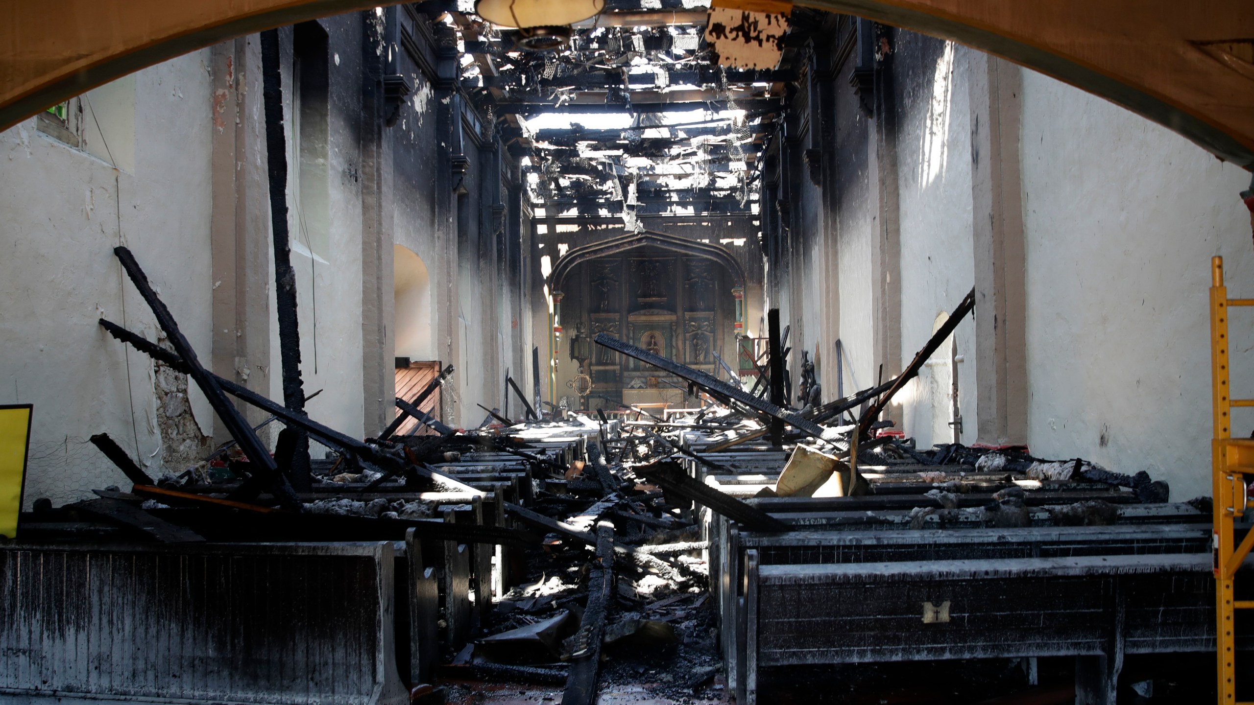 The interior of the San Gabriel Mission is damaged following a morning fire, Saturday, July 11, 2020, in San Gabriel. (Marcio Jose Sanchez / Associated Press)