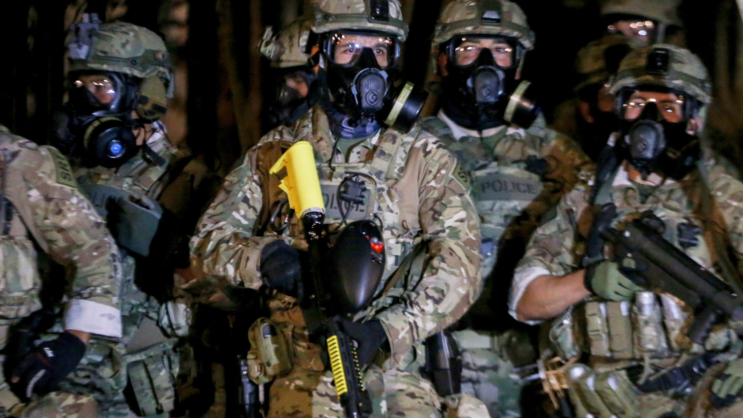 Officers prepare for a demonstration in Portland, Oregon on July 16, 2020. (Beth Nakamura/The Oregonian via AP)