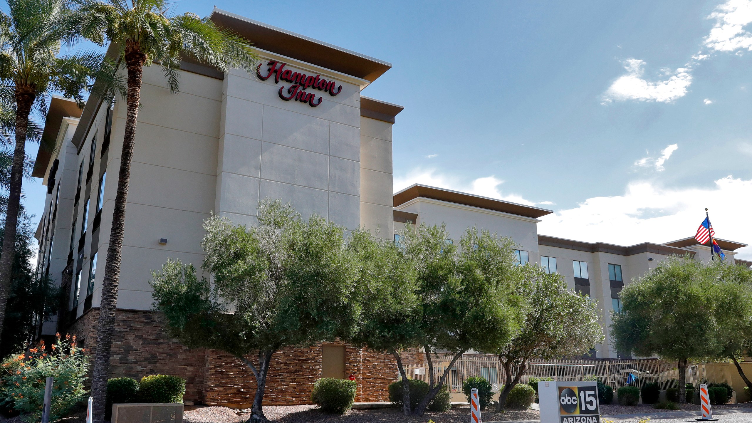 A Hampton Inn is shown Tuesday, July 21, 2020 in Phoenix. (AP Photo/Matt York)