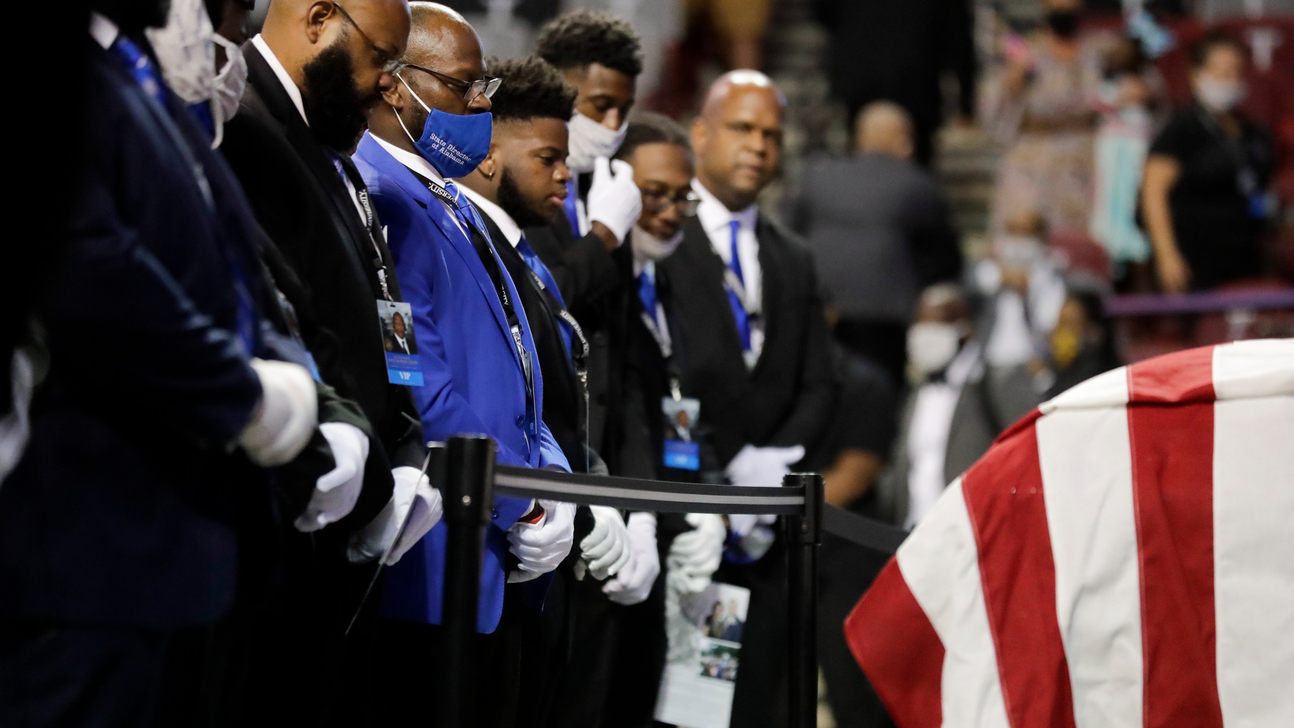 Fraternity members sing in front of the casket of the late Rep. John Lewis, D-Ga., during a service celebrating "The Boy from Troy" at Troy University on July 25, 2020, in Troy, Ala. (AP Photo/Brynn Anderson)