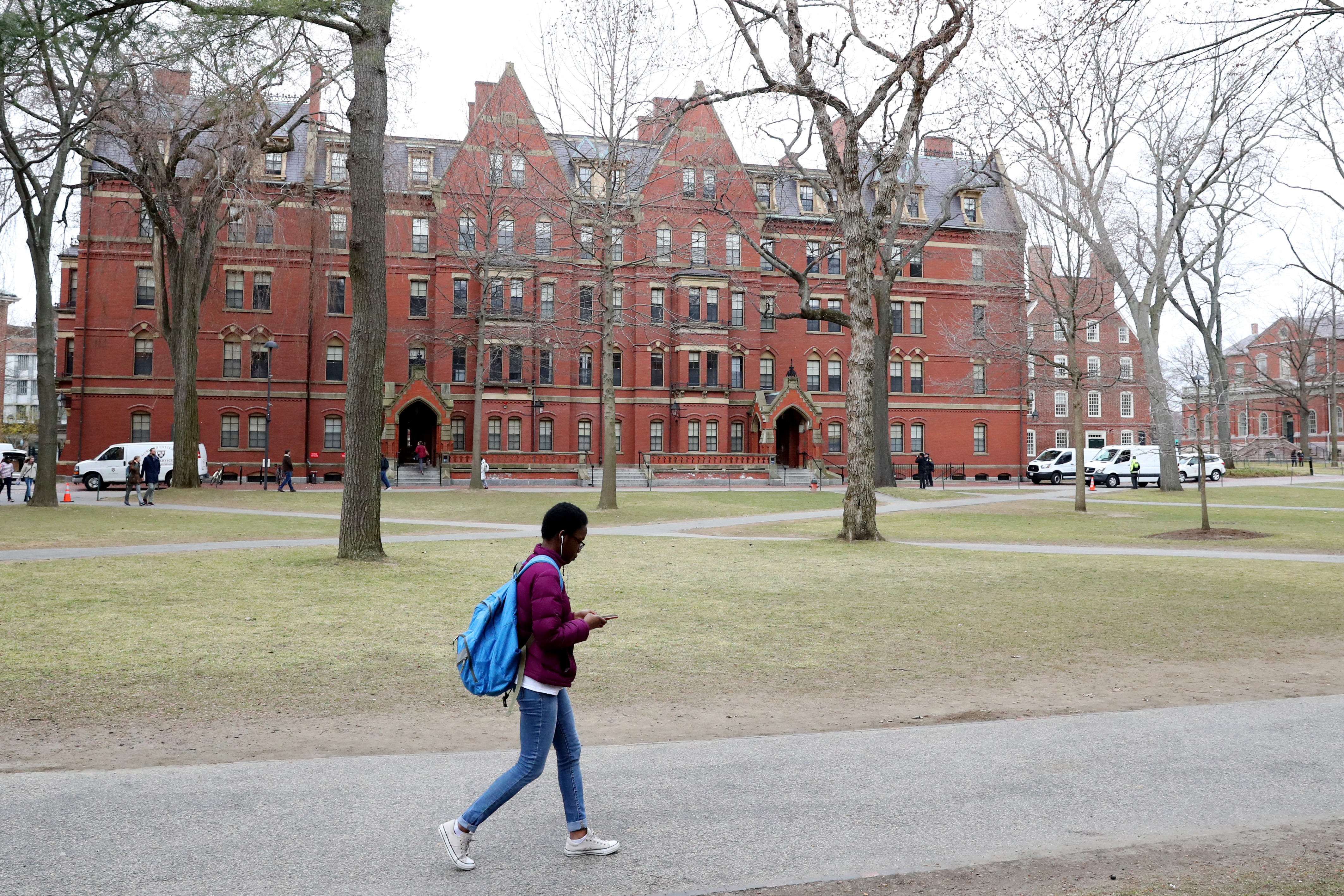 A student walks through Harvard Yard on the campus of Harvard University on March 12, 2020, in Cambridge, Massachusetts. (Maddie Meyer/Getty Images)