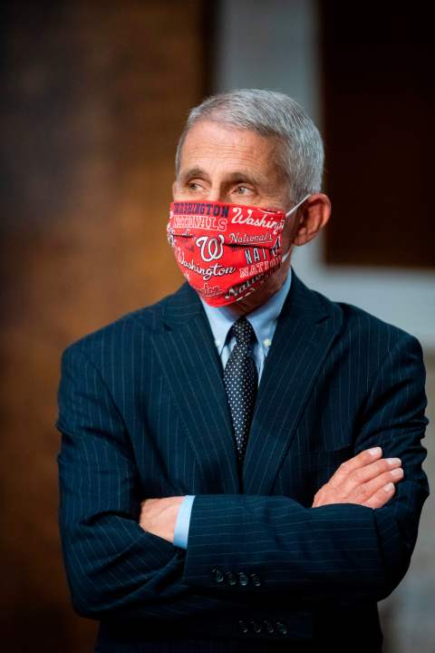 Dr. Anthony Fauci, director of the National Institute of Allergy and Infectious Diseases, wears a Washington Nationals face covering as he arrives during a Senate Health, Education, Labor and Pensions Committee hearing in Washington, DC, on June 30, 2020. (AL DRAGO/AFP via Getty Images)